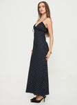 side view of model wearing Princess Polly Emily Maxi Dress Black Polka Dot V-Neck 