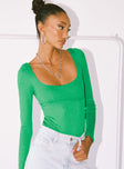 side view of model wearing Princess Polly Crosby Long Sleeve Bodysuit Green Full Sleeves Scoop Neck 