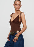 side view of model wearing Princess Polly Prichard Bodysuit Brown Sleeveless 