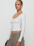 side view of model wearing Princess Polly Daphine Long Sleeve Top Grey Full Sleeves Scoop Neck 