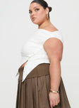 side view of model wearing Princess Polly Karre Off The Shoulder Top White Curve Short Sleeves Asymmetric Neckline 