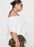 side view of model wearing Princess Polly Kippa Off The Shoulder Tee White Curve Half Sleeves Asymmetric Neckline 