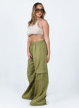 Front view of model wearing  front Princess Polly Low Rise Pants Low Rise Pants  Lista Elastic Pocket Pants Green