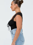 side view of model wearing Princess Polly Clarendon Bodysuit Black Short Sleeves Sweetheart 