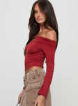 side view of model wearing Princess Polly Kressida Off The Shoulder Top Red Full Sleeves Asymmetric Neckline 