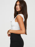 side view of model wearing Princess Polly Sharnee Top White Sleeveless Scoop Neck 