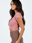 side view of model wearing Princess Polly Daraleen Top Pink Short Sleeves Scoop Neck 