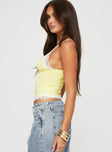 side view of model wearing Princess Polly Dos Fitted Cami Yellow Sleeveless Plunger 