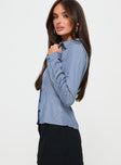 side view of model wearing Princess Polly Fogler Shirt Blue Stripe Full Sleeves V-Neck 