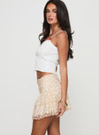   side view of model wearing Princess Polly Finlie Lace Rara Skirt Cream / Floral Mini Skirts 