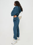 back view of model wearing Princess Polly Princess Polly Track Pants Block / Cursive Text Slate Mid Rise 