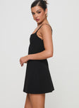 side view of model wearing Princess Polly Rousselet Mini Dress Black Square Neck 