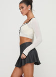   side view of model wearing Princess Polly Little Bow Peep Mini Skirt Grey Mini Skirts 