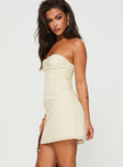 side view of model wearing Princess Polly Malena Strapless Mini Dress Lemon Sweetheart Neckline 