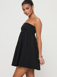 side view of model wearing Princess Polly Osment Strapless Mini Dress Black Straight Neck 