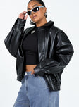 Black bomber jacket Faux leather material Pointed collar Twin hip pockets Elasticated waistband  Single button cuff