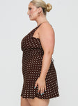 side view of model wearing Princess Polly Nellie Mini Dress Brown Polka Dot Curve Plunger 