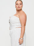 side view of model wearing Princess Polly Freddle Strapless Top White Stripe Curve Sleeveless Sweetheart 