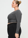 side view of model wearing Princess Polly Moylan Long Sleeve Top Grey Curve Full Sleeves V-Neck 