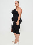 side view of model wearing Princess Polly Evanda Top Black Curve Sleeveless V-Neck 