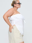 side view of model wearing Princess Polly Kiji Strapless Top White Curve Sleeveless straight 