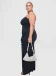 side view of model wearing Princess Polly Destinations Maxi Dress Navy Curve Sweetheart Neckline 