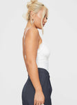 side view of model wearing Princess Polly Hollywood Boulevard Top White Sleeveless V-Neck 