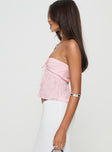 side view of model wearing Princess Polly Rosenberg Strapless Top Pink Sleeveless Sweetheart 