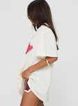 side view of model wearing Princess Polly Kewpie Angel Vs Devil Oversized Tee White Half Sleeves Crew Neck 