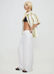 side view of model wearing Princess Polly Grove Mesh Pants White Low Rise Pants 