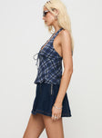 side view of model wearing Princess Polly Lemoni Skort Denim Mid Wash High Waisted Shorts 