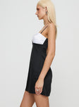 side view of model wearing Princess Polly Fabulous Mini Dress Black / White Sweetheart Neckline 