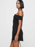 side view of model wearing Princess Polly Lanes Off The Shoulder Mini Dress Black Straight Neck 