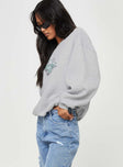 side view of model wearing Princess Polly Retro Car Crew Neck Sweatshirt Grey Marle 