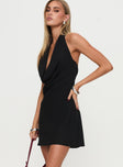 side view of model wearing Princess Polly Ocean Boulevard Plunge Mini Dress Black Cowl Neck 