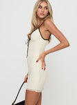 side view of model wearing Princess Polly Nolane Mini Dress Cream V-Neck 