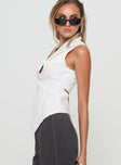 side view of model wearing Princess Polly Campus Long Line Vest White Sleeveless V-Neck 