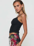 side view of model wearing Princess Polly Zachariah Cami Top Black Sleeveless Square Neck 