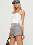 side view of model wearing Princess Polly Sincar Boxer Shorts Black / White Stripe High Waisted Shorts 