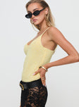 side view of model wearing Princess Polly Annaka Top Yellow Sleeveless Scoop Neck 