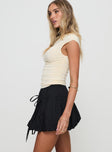   side view of model wearing Princess Polly Vannes Bubble Hem Mini Skirt Black Mini Skirts 