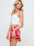   side view of model wearing Princess Polly Tylar Mini Skirt Red Floral Mini Skirts 