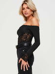 side view of model wearing Princess Polly Valder Off The Shoulder Bodysuit Black Full Sleeves straight 