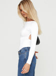 side view of model wearing Princess Polly Gatewood Long Sleeve Bodysuit White Tall Full Sleeves Boat Neck 