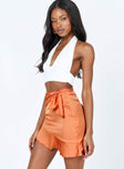   side view of model wearing Princess Polly Loraine Mini Skirt Orange 