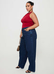 side view of model wearing Princess Polly Britta Mid Rise Tapered Leg Jeans Dark Wash Curve High Waisted 