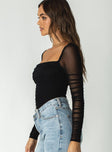 side view of model wearing Princess Polly Delany Bodysuit Black Full Sleeves Square Neck 