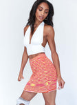   side view of model wearing Princess Polly Leo Knit Mini Skirt Orange 