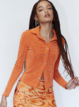 front view of model wearing Princess Polly Elody Long Sleeve Top Orange 