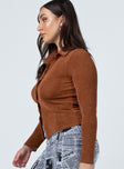 side view of model wearing Princess Polly Elody Long Sleeve Top Brown 